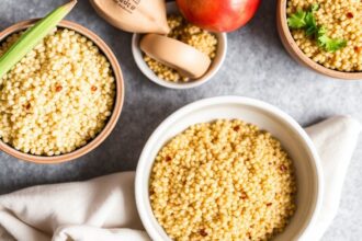 Golden Quinoa bowl with colorful vegetables and a small trophy symbolizing grain battle victory